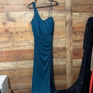 Teal party dress. Ankle length (long if you’re short) with split on left thigh